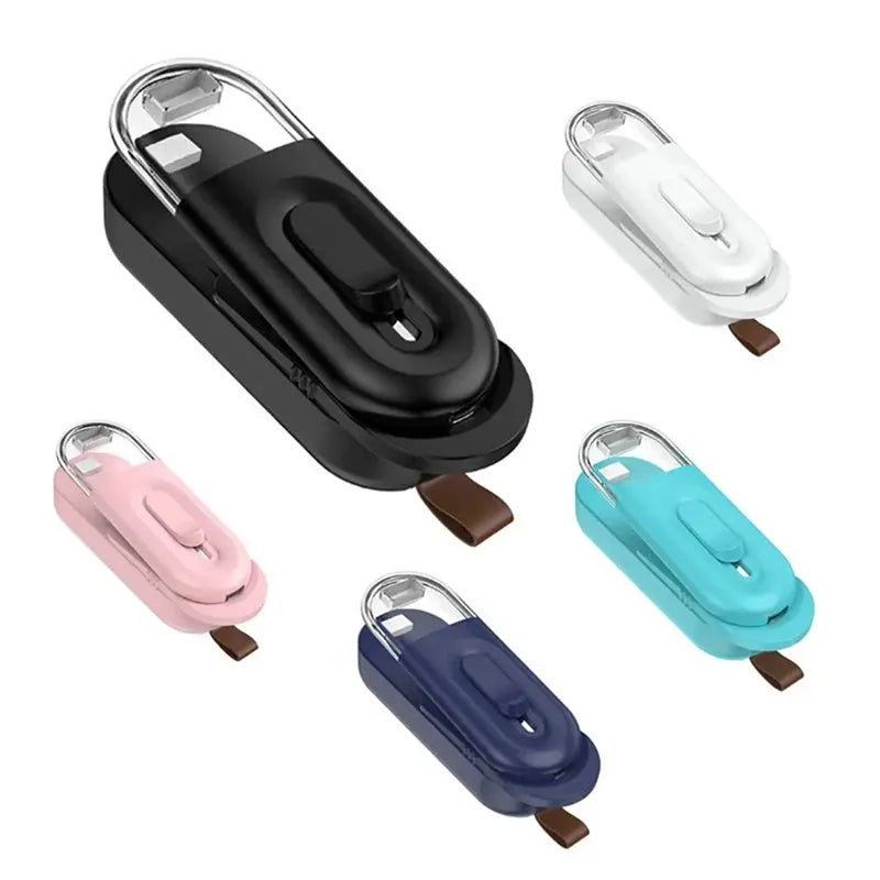 Handheld ABS bag sealer and resealer with cutter, battery powered, 100 x 38 x 35mm, in black, white or Lake Blue.