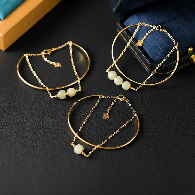 Women's Hetian jade lucky beads bracelet with gold inlay, shown in single, double, and three bead version styles.