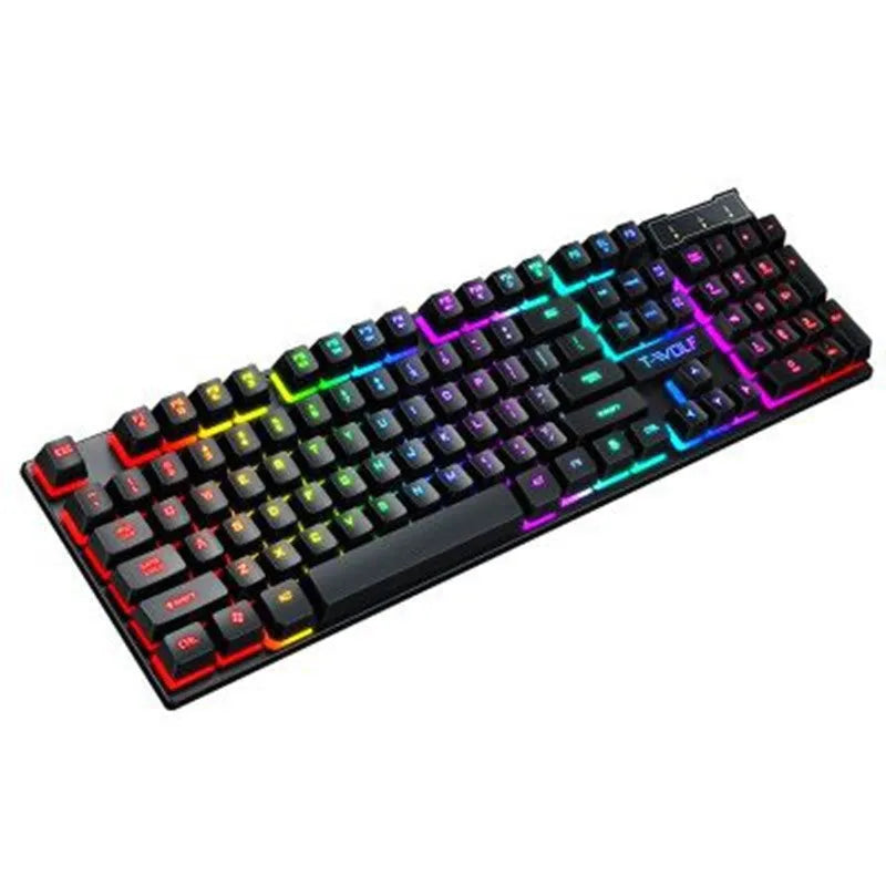 USB wired gaming keyboard with floating keycaps showing colourful backlight and multimedia shortcut row on a desktop