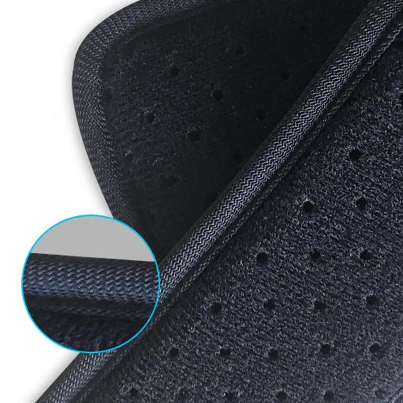 Black breathable posture correction belt with figure 8 design and adjustable straps on a plain background