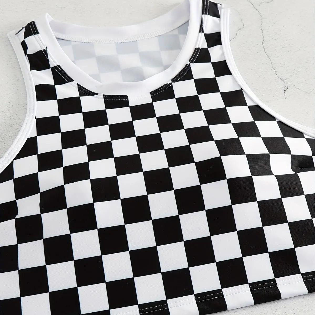 Checkered racing one-piece swimsuit with backless design and suspender straps
