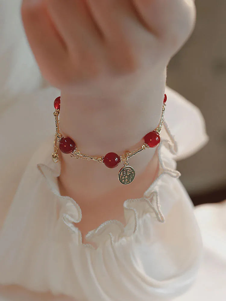 Red Agate Hongma blessing card double-layer charm bracelet for women in a gift box.