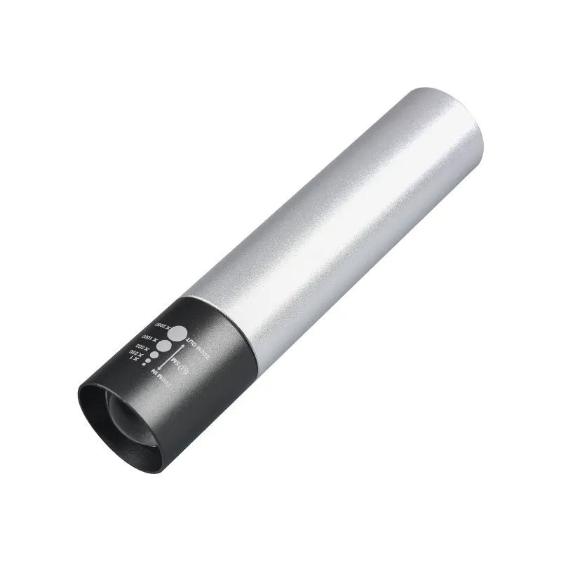 Black and silver aluminium red light therapy mosquito repellent lamp with charging cable.