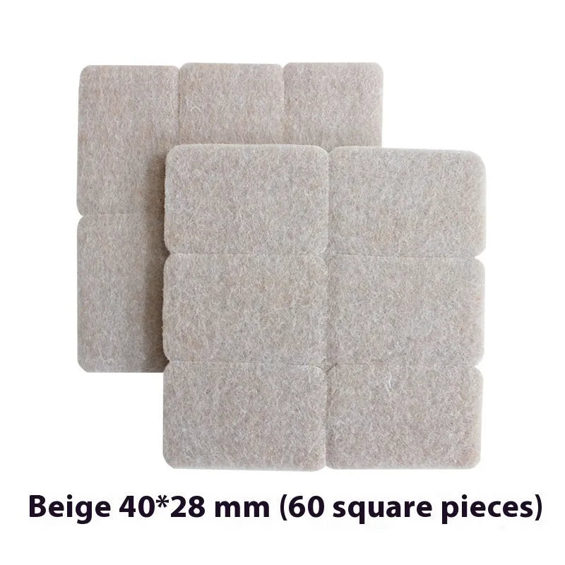 Beige plastic furniture protection foot pads in five different sizes on a wooden floor.