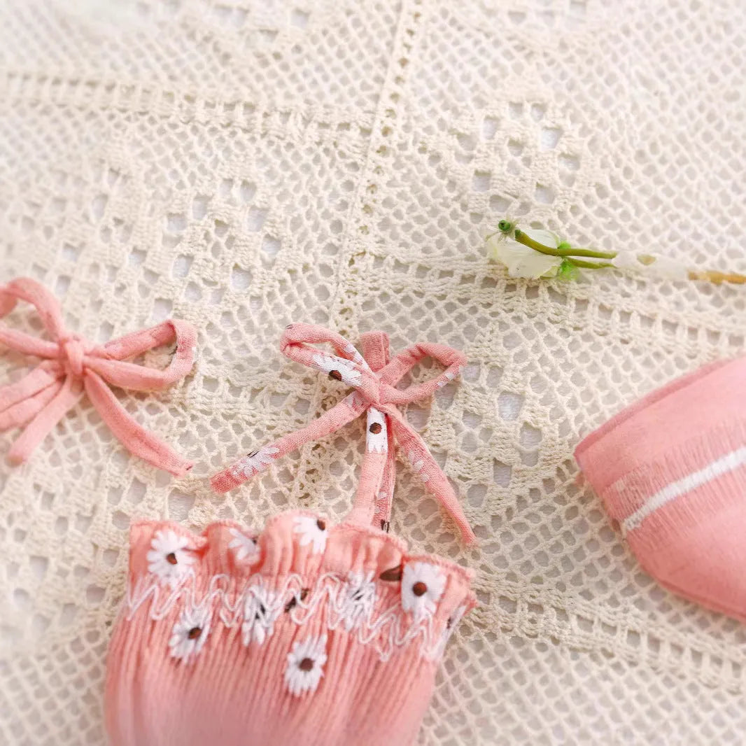 Pink cotton baby girl short-sleeved triangle jumpsuit with bow flower print and matching headband