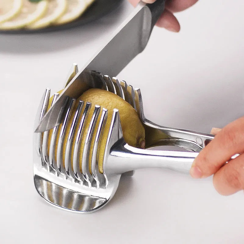 Silver-coloured plastic foldable lemon slicer kitchen gadget for cutting fruits and cakes