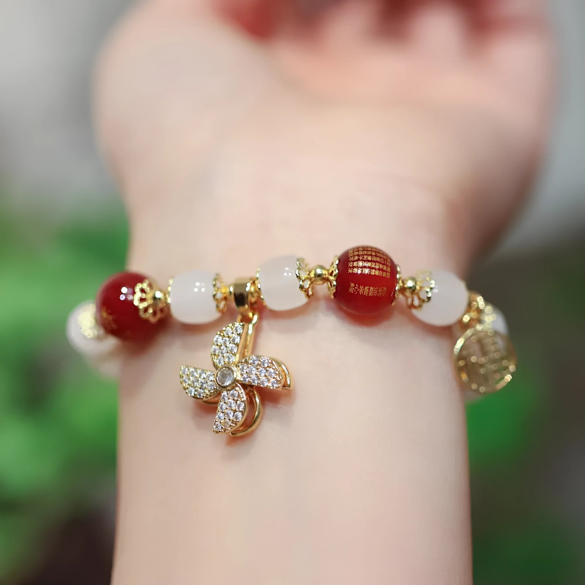 Women's Chinese style coloured glaze glass bracelet with safety lock, windmill, and bamboo charms