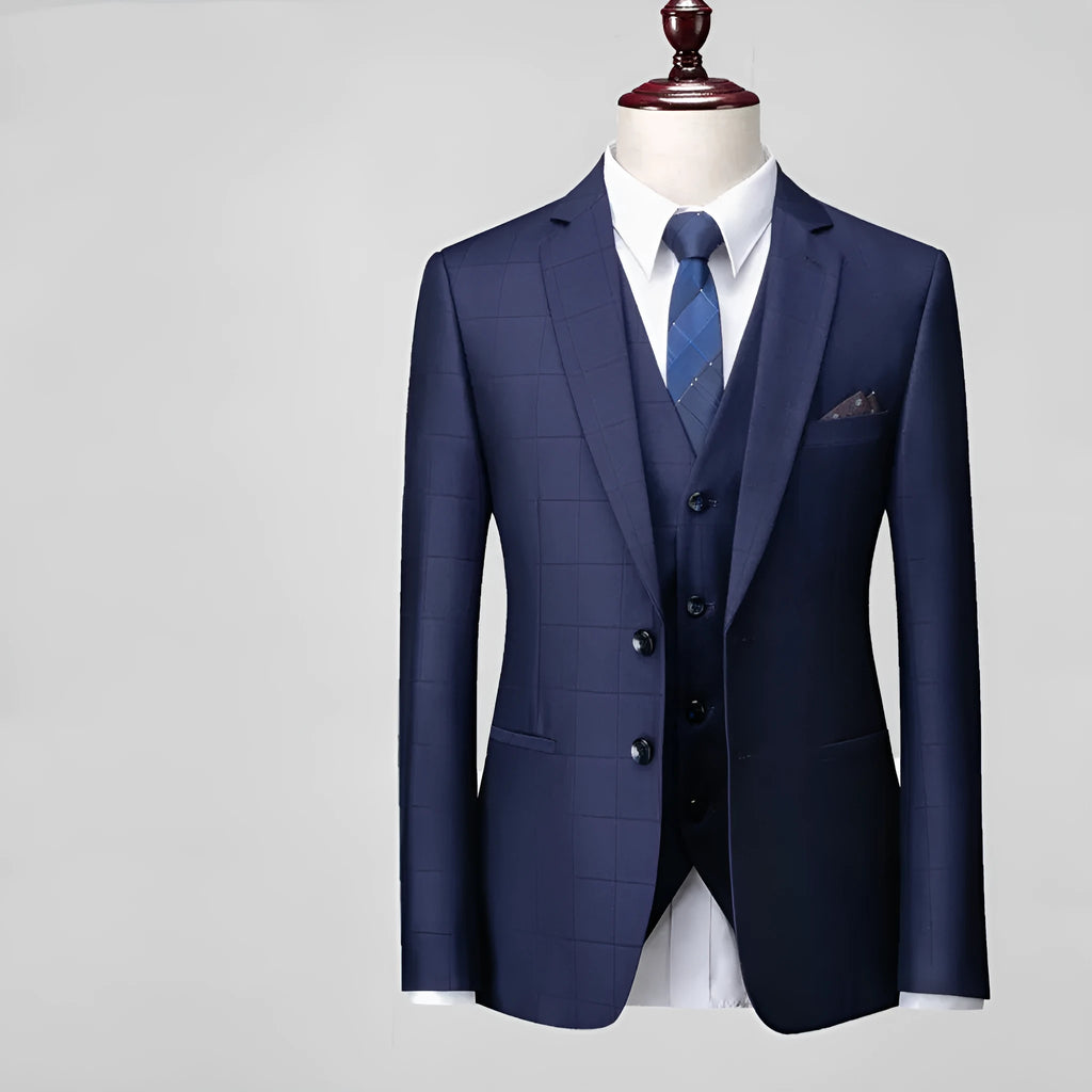 Men's navy blue slim fit three-piece plaid suit with vest, jacket and trousers on hanger