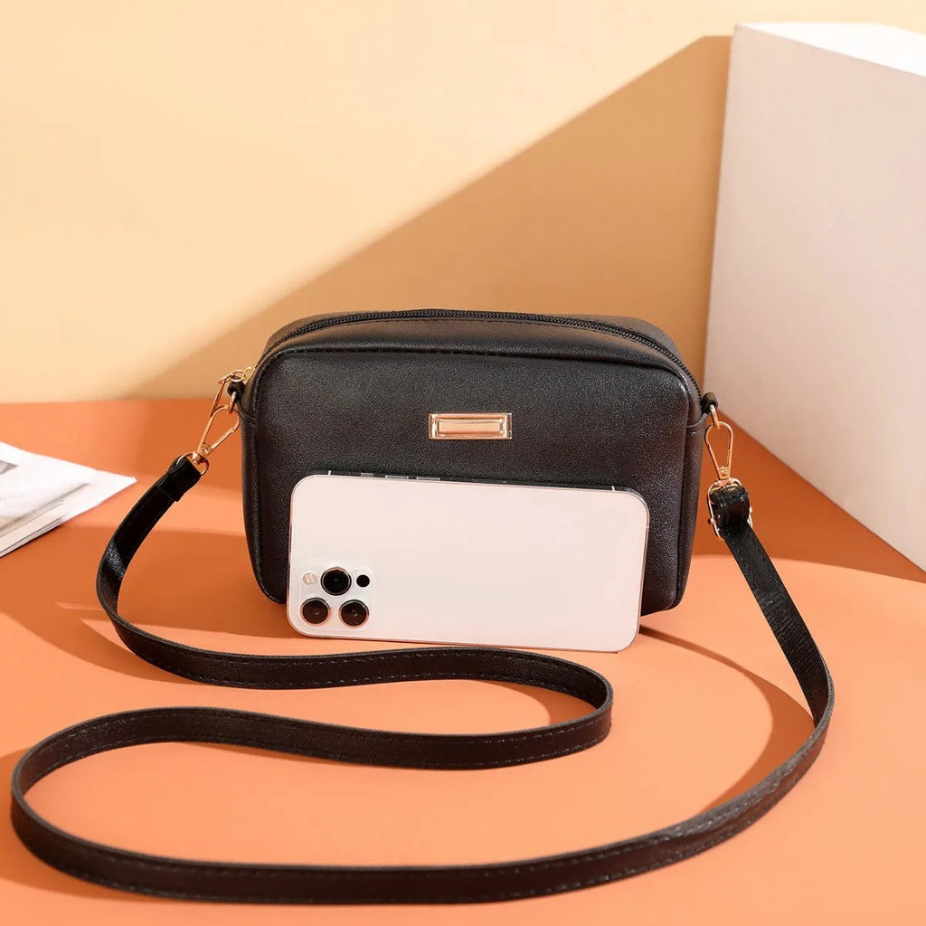 Women's solid colour PU shoulder bag with three-dimensional pocket and horizontal square shape