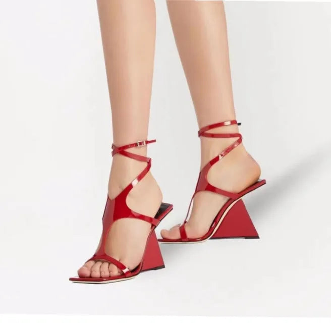 Women's black high heel sandals with a 9.5cm block heel and square toe design on a white background.