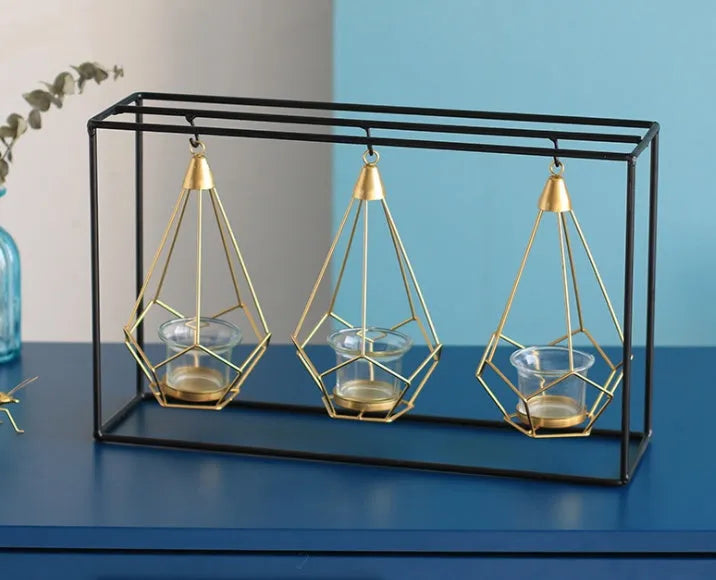 Iron candle holders for block candles in six Nordic styles: single, double, triple, triangle, rectangular.