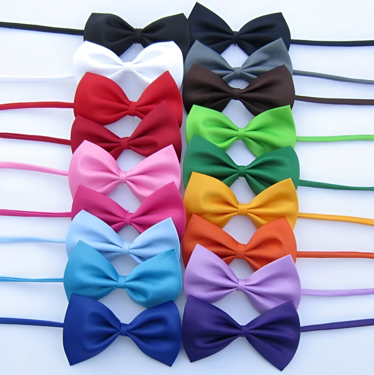 Adjustable dog and cat bow tie neck tie in 17 colours including black, red, blue, green, pink, and yellow