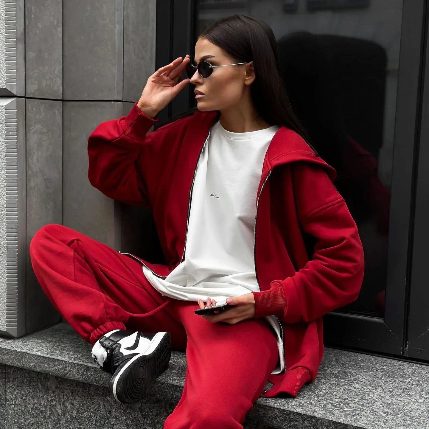 Long-sleeved coat and trousers two-piece set in a solid colour, loose street style fit.