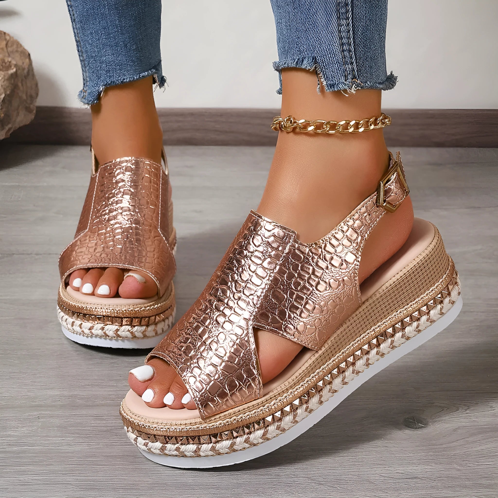 Gold women's Roman sandals with round toe, openwork design and ankle buckle strap