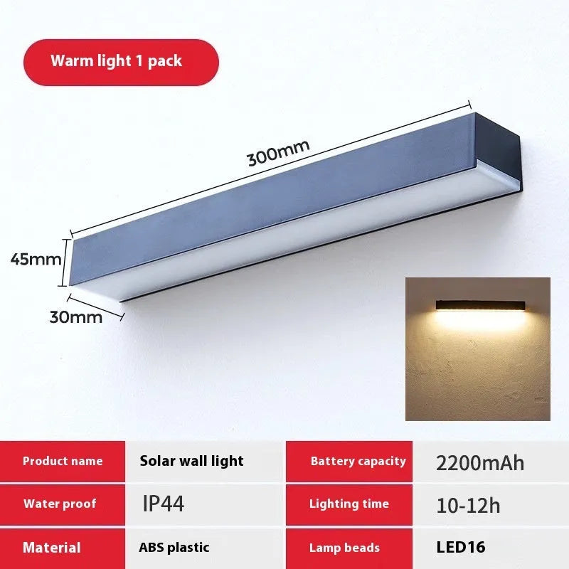 Black solar garden wall light with solar panel and IP65 waterproof rating