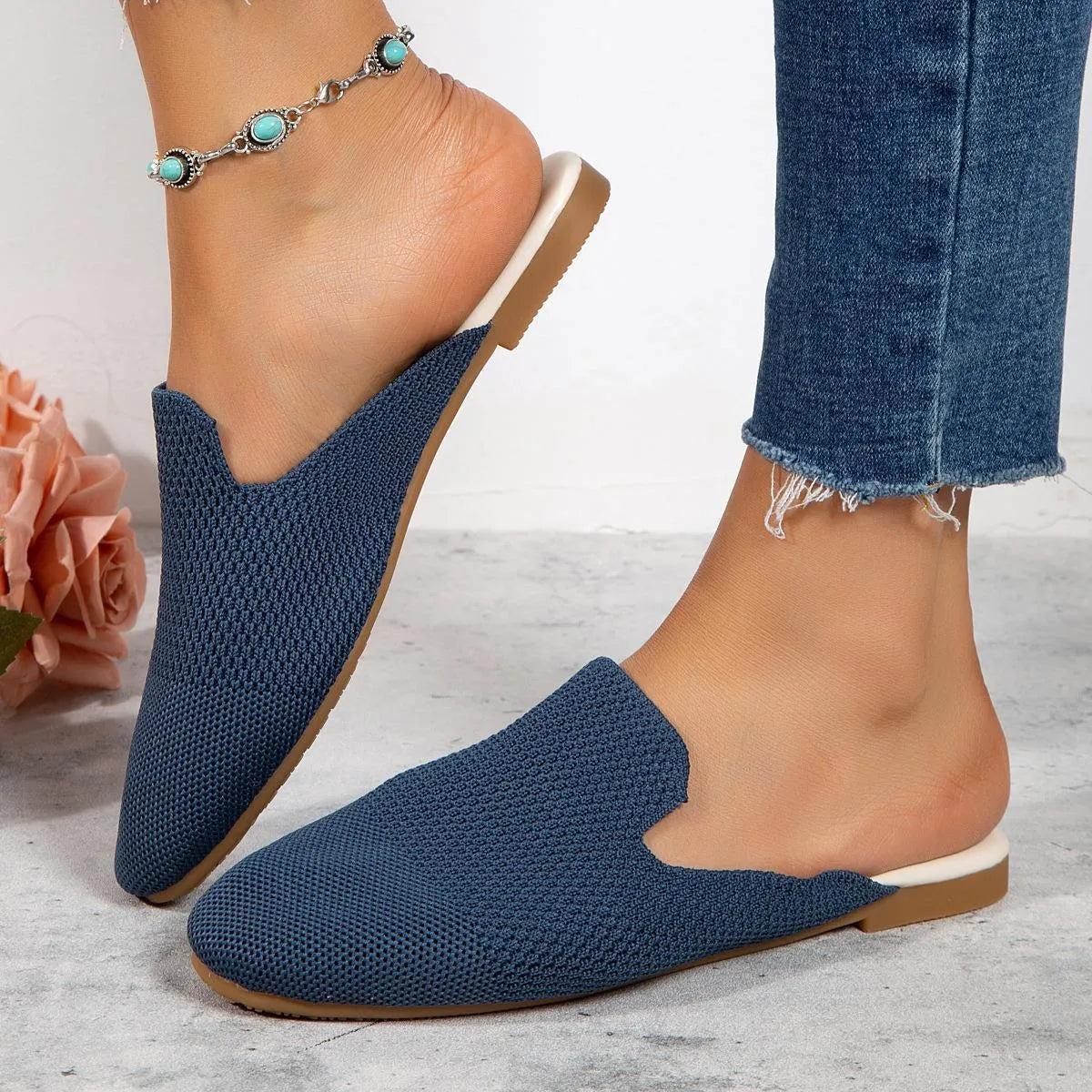 Apricot, blue, and green mesh slip-on flat sandals with round toe and cloth upper.