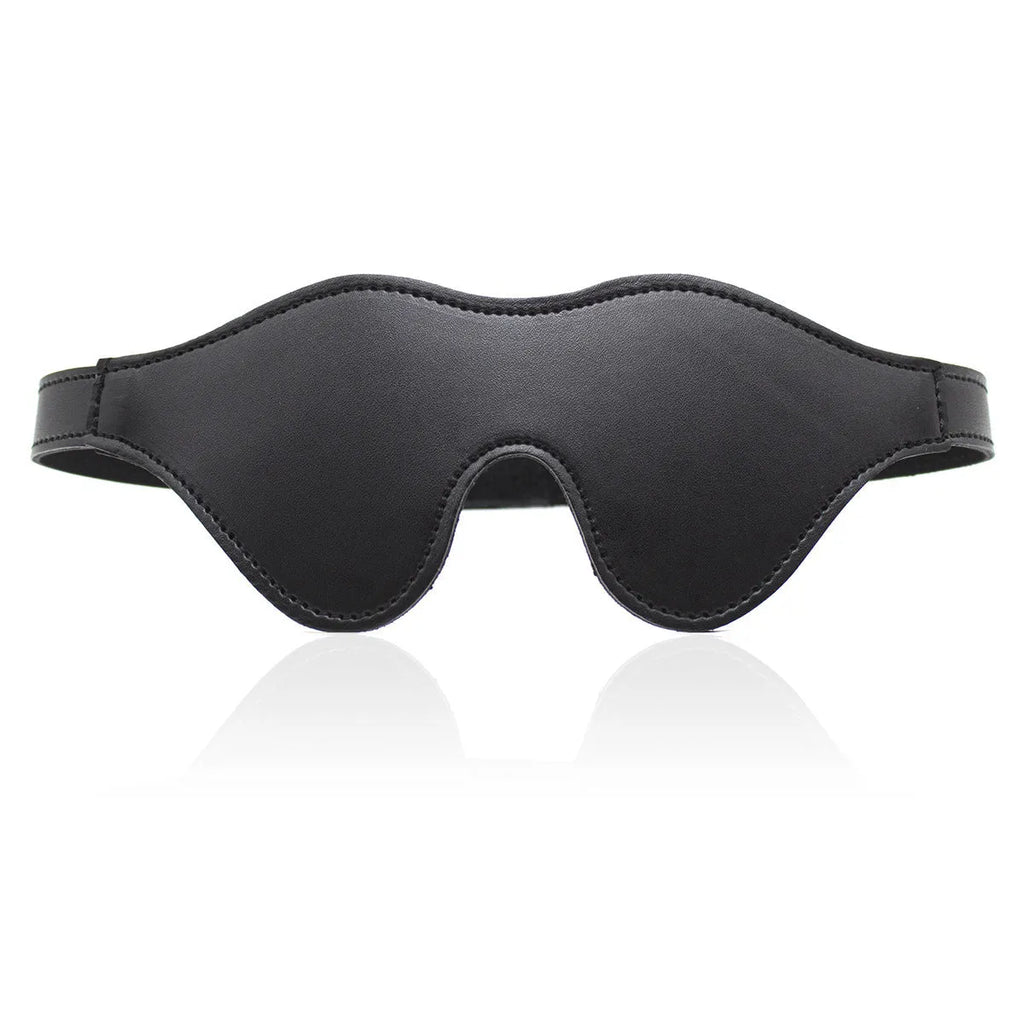Women's black leather velcro eye mask blindfold showing three-dimensional shape and metal hardware.