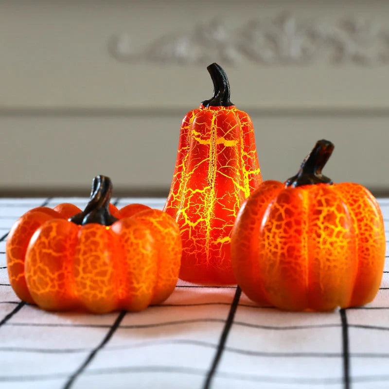 Enchanting resin pumpkin lanterns with realistic textures and LED candle illumination for Halloween decor and celebrations