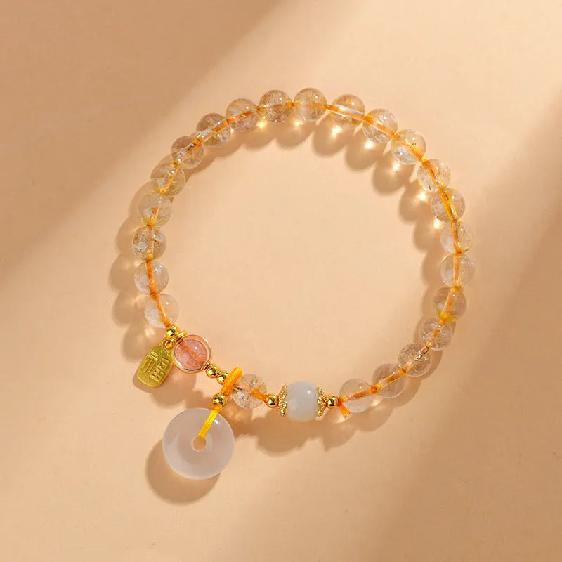 Gold rutilated quartz bracelet with safety buckle and geometric pendant in national style