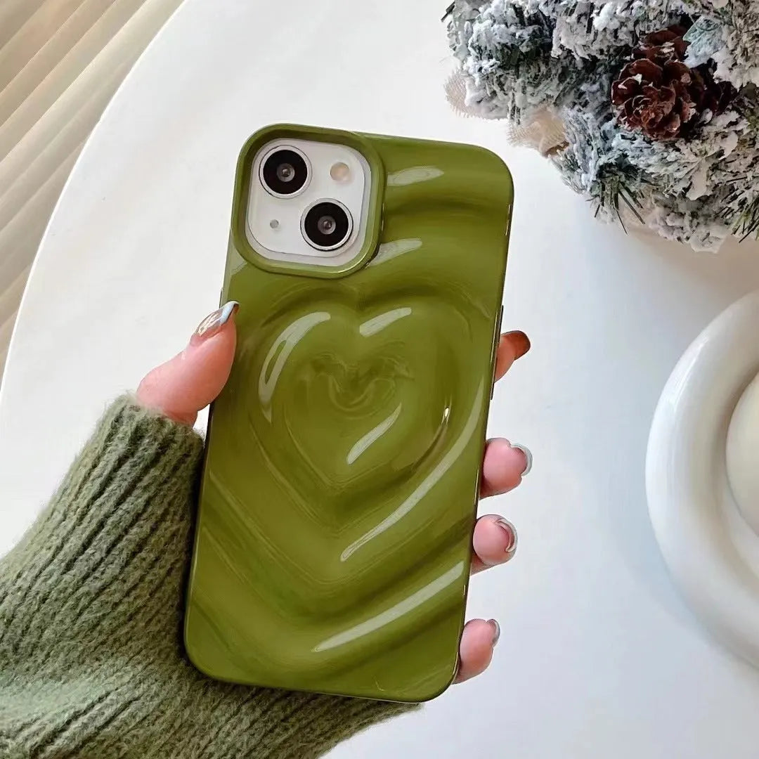 Solid colour iPhone case with a raised 3D love design on the back, shown in bright purple.