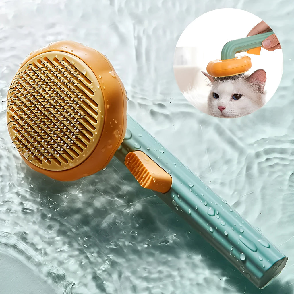 Hand-held pet grooming brush with stainless steel needles in pumpkin colour design