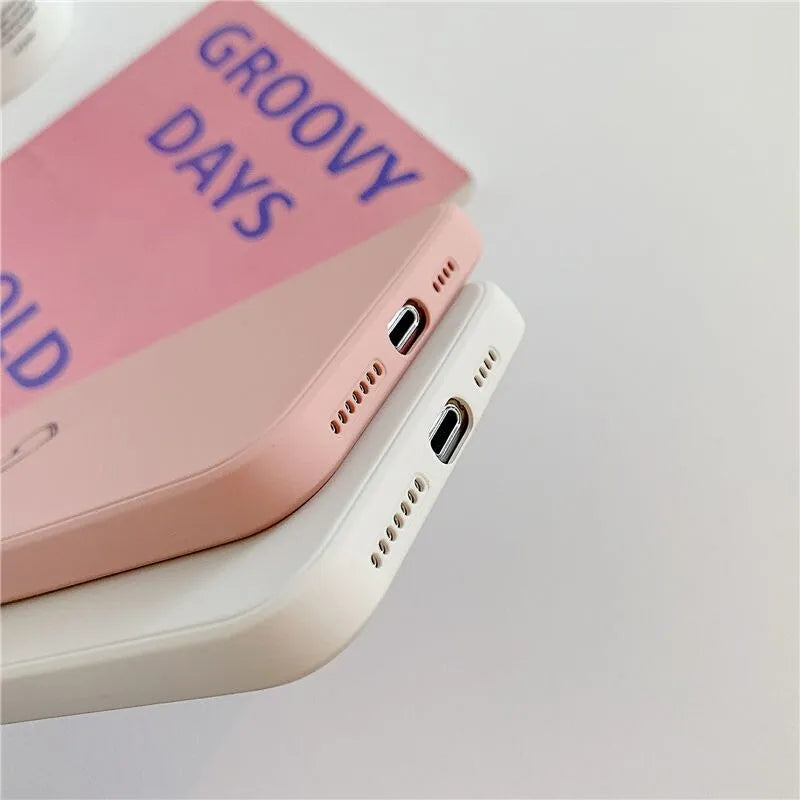 Silicone phone case for Apple iPhone in various colours showing TPU construction