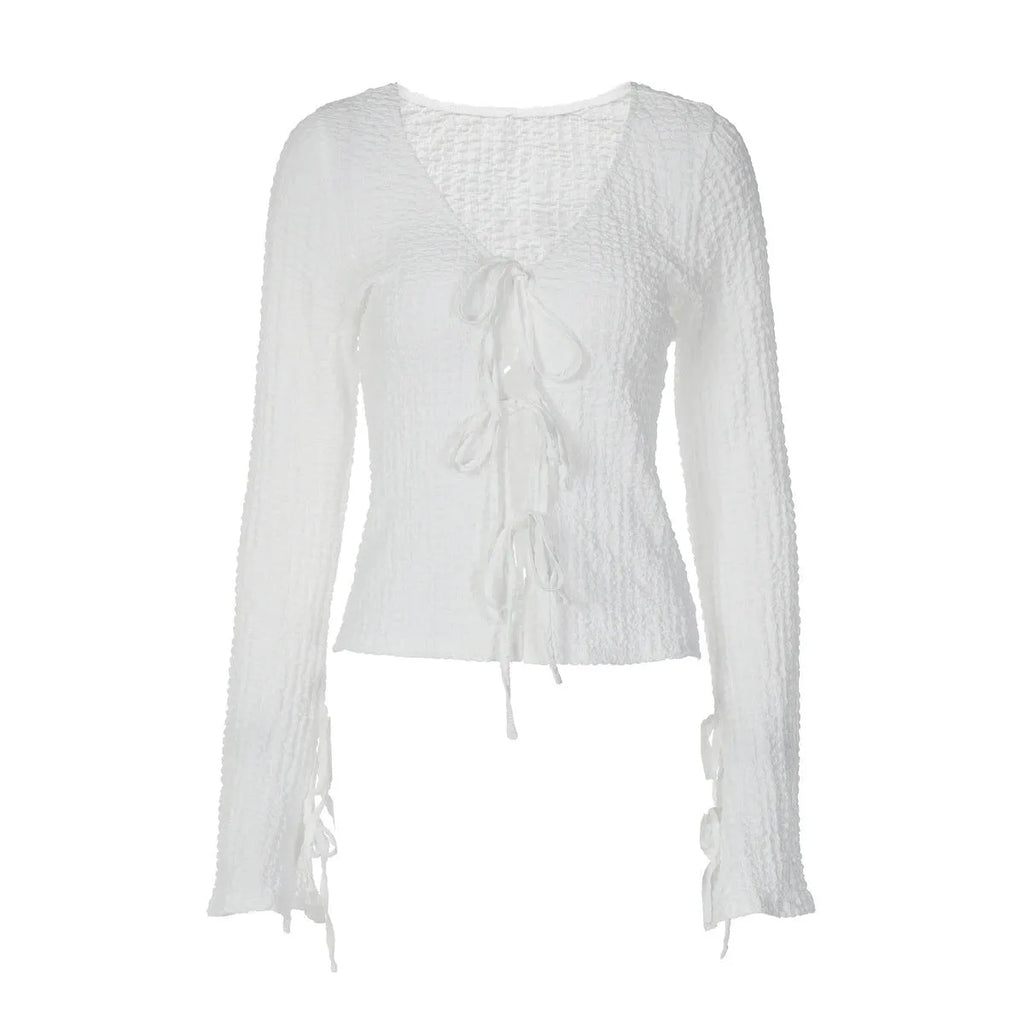 White lace-up backless long sleeve cardigan on a woman for casual layering