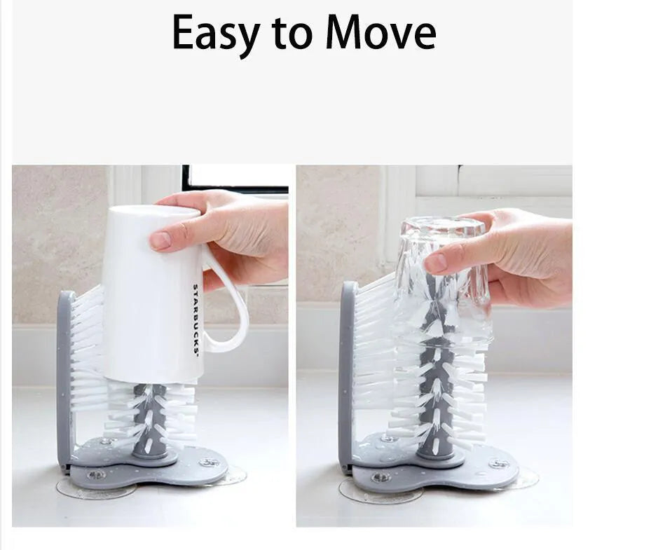 Grey rotating cup brush with two suction cups for wall mounting, shown cleaning a glass