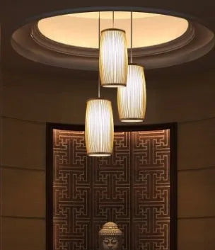 Small woven bamboo pendant lamp with E27 holder, 15cm wide by 35cm high.