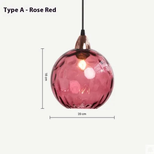 Modern spherical glass pendant light with water-wave texture, shown in a solid colour, hanging from a ceiling.