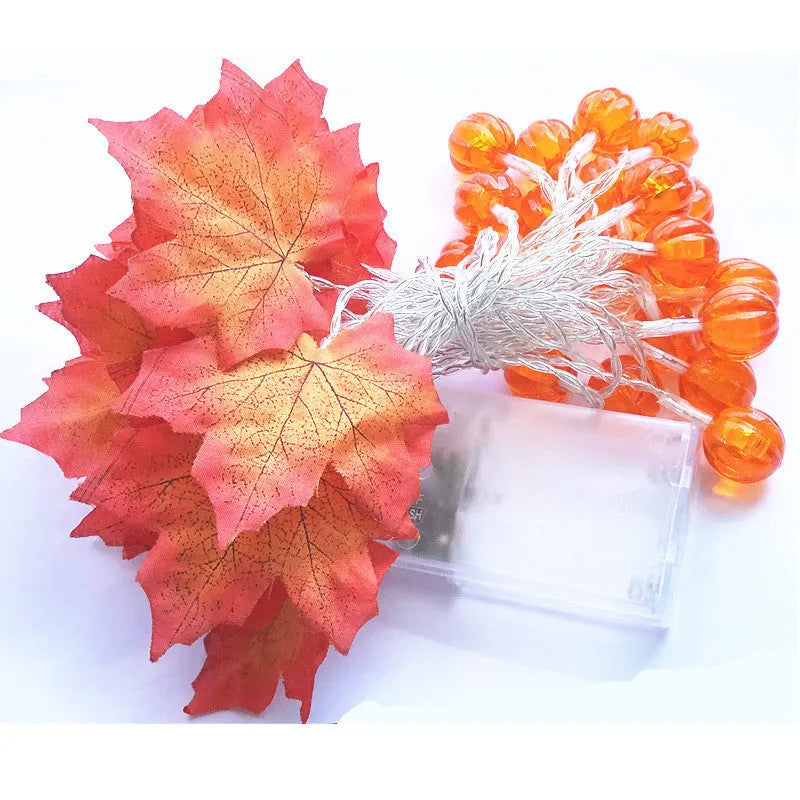 Halloween LED string lights with pumpkin and maple leaf designs, 1.5m 10-light warm white battery-operated decoration