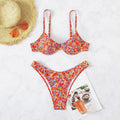 Red floral high waist split swimsuit for women on a white background.