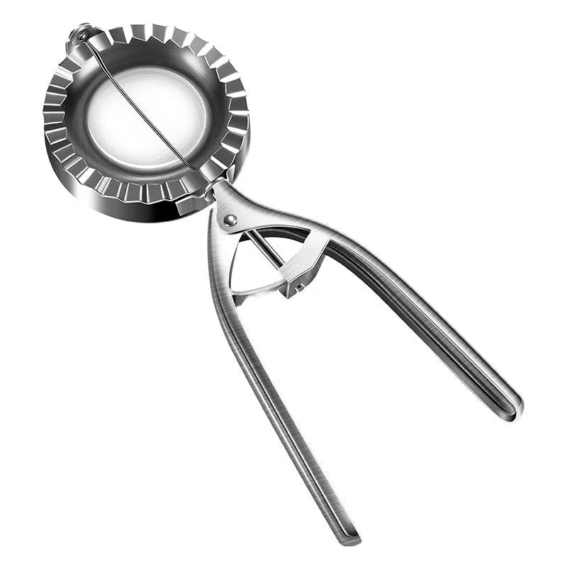 Silver stainless steel manual dumpling maker tool for pressing homemade dumplings.
