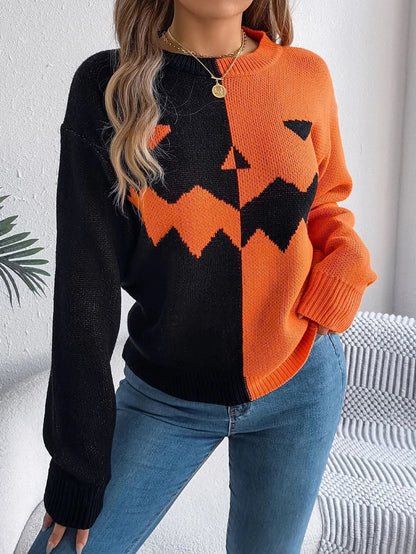 A cozy, acrylic Halloween pullover sweater with a ghostly design in autumnal colors