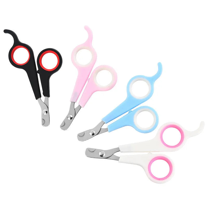 Mini plastic pet nail clippers in blue white and pink white colours on OPP packaging