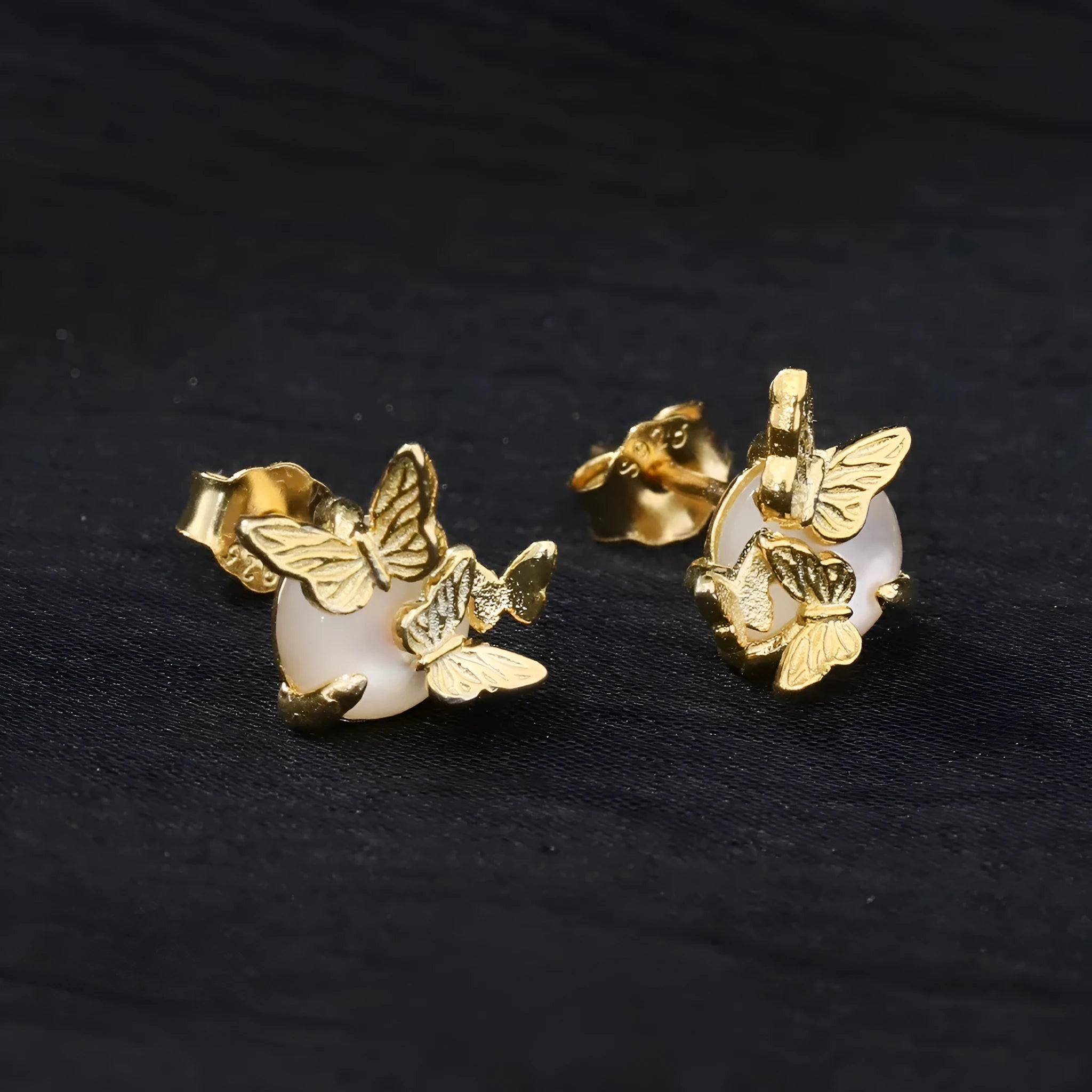 Butterfly ear studs in 925 silver with gold electroplated finish and animal zodiac modelling details