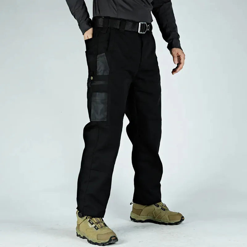 Multi-pocket water repellent outdoor pants in polyester cotton blend, available in five colours, sizes S to XXXL