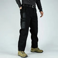 Multi-pocket water repellent outdoor pants in polyester cotton blend, available in five colours, sizes S to XXXL