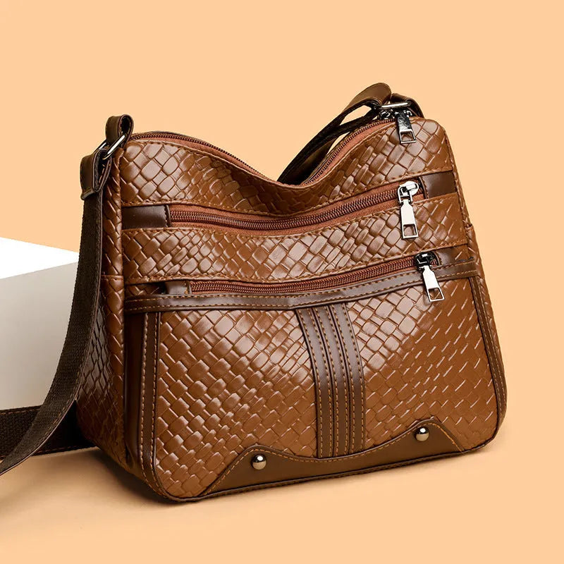 Woven PU leather messenger bag with multiple compartments and single shoulder strap
