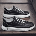Men's white casual shoes with PU leather upper, round toe, and flat bottom low heel design
