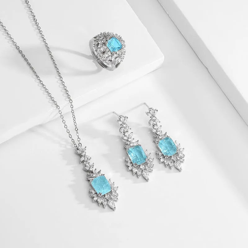 Coloured gem blue zircon necklace with copper material and quadrilateral design element