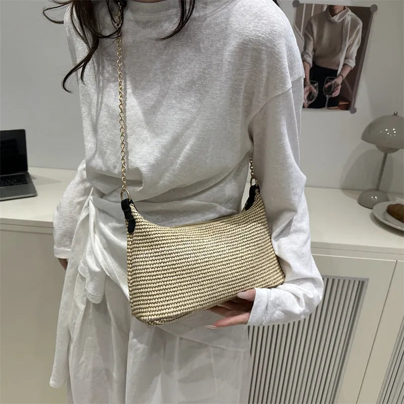 Horizontal square straw woven beach tote bag with sandwich pocket and internal phone compartment