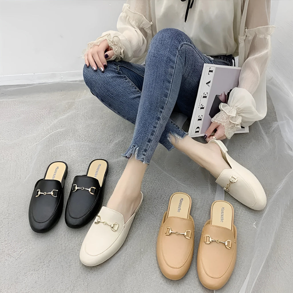 Women's PVC closed toe half slippers with buckle fastening in milky white