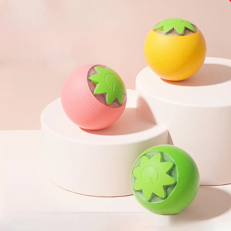Green electric rolling ball toy for dogs and cats measuring 4.5cm