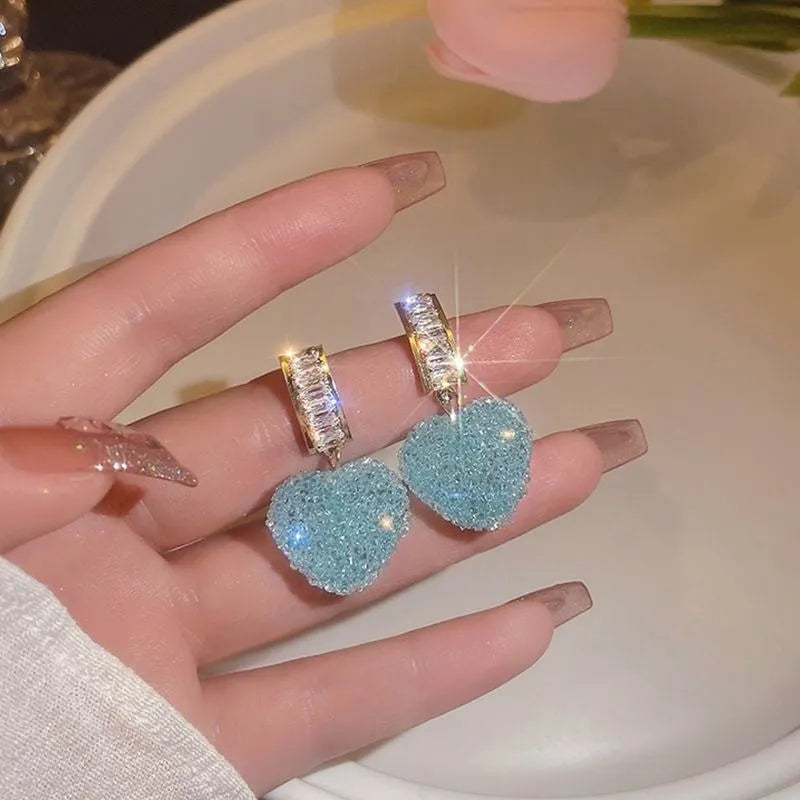 Candy stud earrings with heart-shaped peach design in pink and blue alloy jewellery options