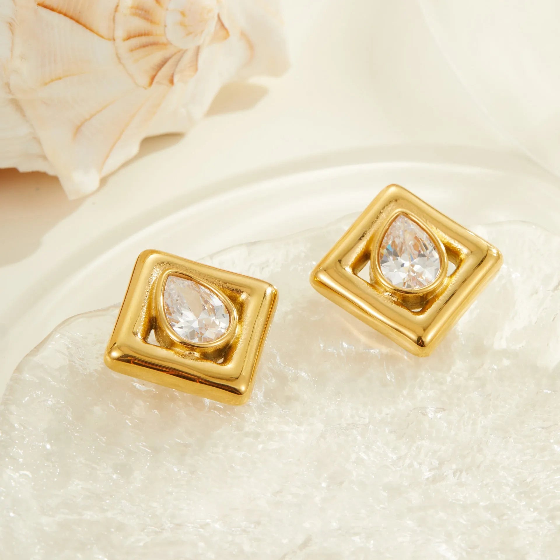 Geometric gold electroplated stud earrings with inlaid water drop zircon stones