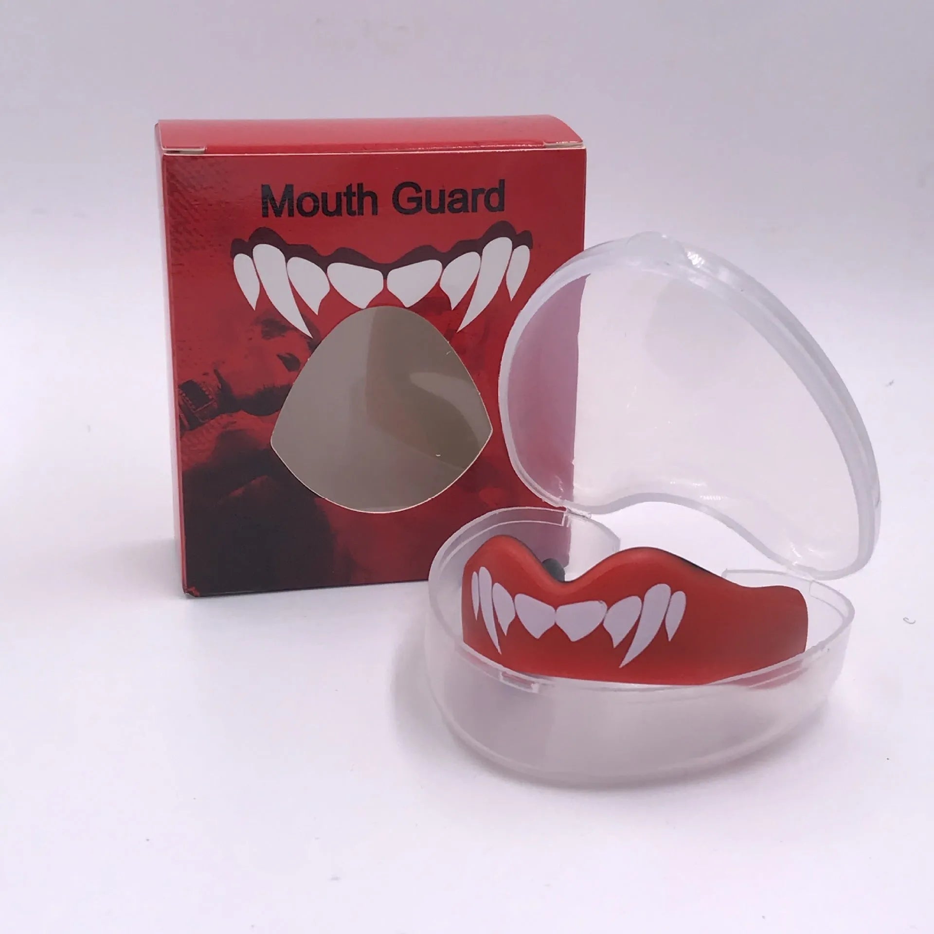 Adult boxing mouthguard with tooth socket design in three colour variations