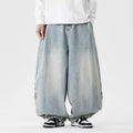 Men's plus size wide leg jeans in denim fabric with straight leg openings and low waist design