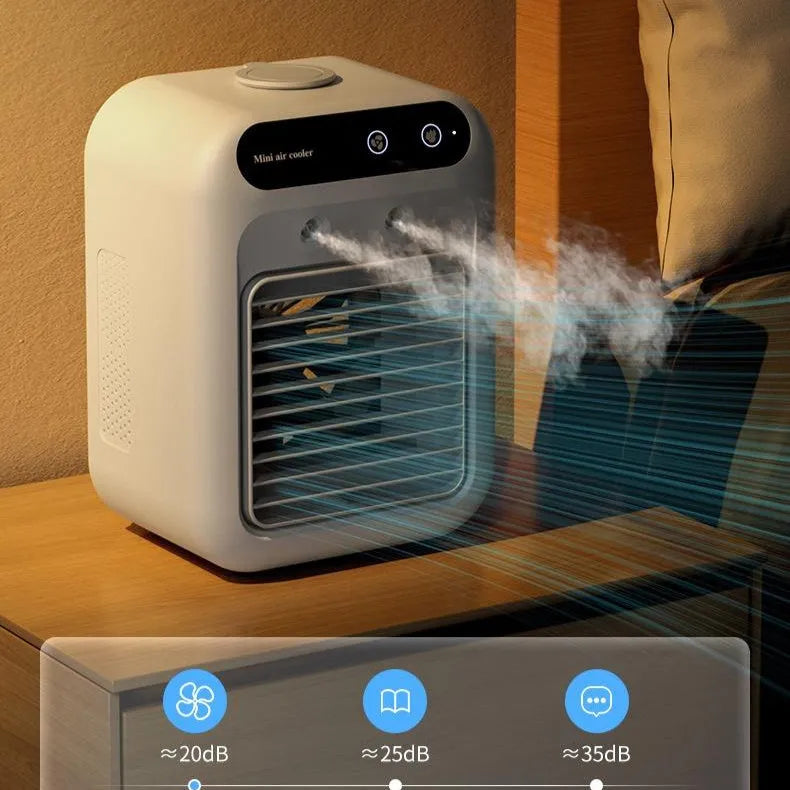 Compact ivory white portable USB air cooler with touchscreen display on a desk.