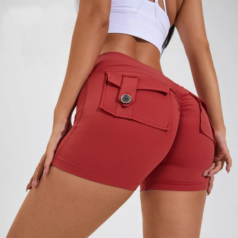 Women's high waist fitness shorts in quick dry nylon fabric with side pockets for summer sports